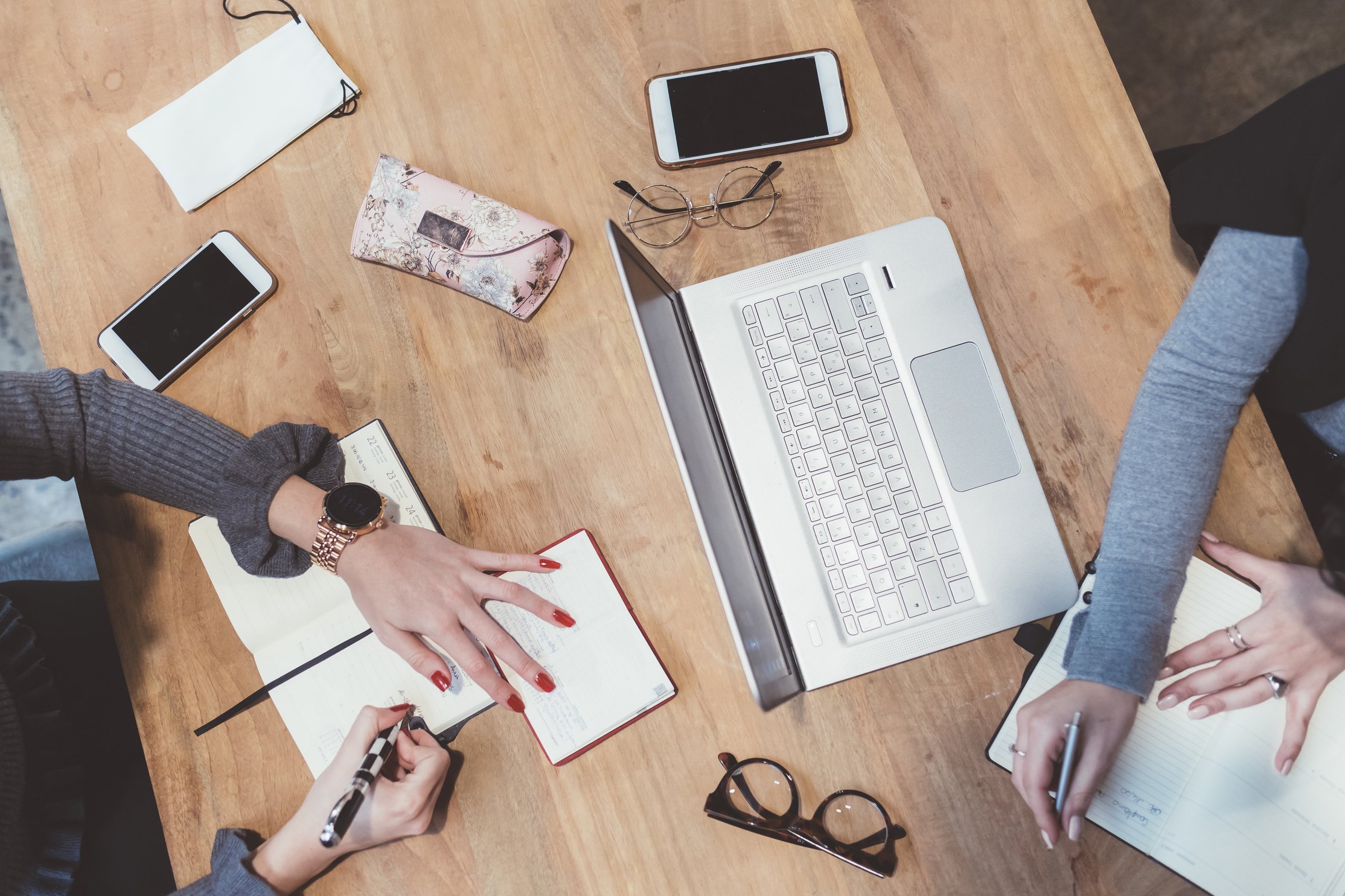 Women indoor sitting working desk